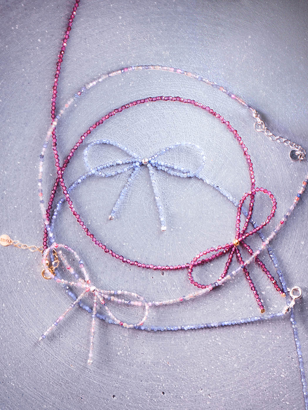 naszyjnik kokardka bestseller srebro 925 kamienie szlachetne